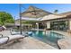 Resort-style pool with spa and outdoor seating at 3611 E Kachina Dr, Phoenix, AZ 85044