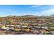 Aerial view of suburban neighborhood and mountain range at 3645 E Shaw Butte Dr, Phoenix, AZ 85028