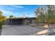 Mid-century modern home with carport and landscaped yard at 3645 E Shaw Butte Dr, Phoenix, AZ 85028