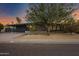 Mid-century modern home at sunset with landscaping at 3645 E Shaw Butte Dr, Phoenix, AZ 85028