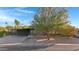 Mid-century modern home with carport and landscaped yard at 3645 E Shaw Butte Dr, Phoenix, AZ 85028