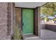 Green front door with diamond pattern and sidelights at 3645 E Shaw Butte Dr, Phoenix, AZ 85028