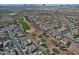 Aerial view of homes surrounding a golf course at 3649 N Hudson Dr, Florence, AZ 85132