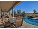 Inviting backyard oasis with a pool and patio furniture at 3649 N Hudson Dr, Florence, AZ 85132