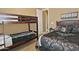 Bedroom with bunk beds and a queen-size bed at 3649 N Hudson Dr, Florence, AZ 85132