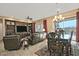 Elegant dining room with a chandelier and access to the backyard at 3649 N Hudson Dr, Florence, AZ 85132