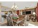 Elegant dining room with a large table and chandelier at 3649 N Hudson Dr, Florence, AZ 85132