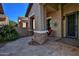 Front porch with wrought iron door and seating area at 3649 N Hudson Dr, Florence, AZ 85132