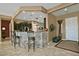 Spacious kitchen featuring a breakfast bar and granite countertops at 3649 N Hudson Dr, Florence, AZ 85132