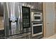 Stainless steel appliances including a built-in microwave and oven at 3649 N Hudson Dr, Florence, AZ 85132