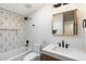 Contemporary bathroom with wave tile and floating vanity at 3929 E Mercer Ln, Phoenix, AZ 85028