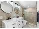 Modern bathroom with double vanity and walk-in shower at 3929 E Mercer Ln, Phoenix, AZ 85028