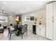 Modern dining area with wine fridge and herringbone floors at 3929 E Mercer Ln, Phoenix, AZ 85028