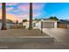 Charming single-story home featuring a well-maintained front yard, attached garage, and inviting curb appeal at 3929 E Mercer Ln, Phoenix, AZ 85028