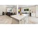 Large kitchen island with white quartz countertop and gold bowl at 3929 E Mercer Ln, Phoenix, AZ 85028