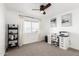 Home office with window, desk, and built-in shelving at 4129 W Hearn Rd, Phoenix, AZ 85053