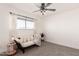 Bright bedroom with comfy daybed and window seating at 4129 W Hearn Rd, Phoenix, AZ 85053