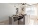 Modern dining room features a sleek table and six chairs at 4129 W Hearn Rd, Phoenix, AZ 85053