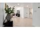 Entryway with tile floors, showing view into living room at 4129 W Hearn Rd, Phoenix, AZ 85053