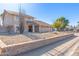 Two-story house with a landscaped yard and two-car garage at 4129 W Hearn Rd, Phoenix, AZ 85053