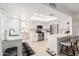 Modern kitchen with white cabinets, stainless steel appliances, and quartz countertops at 4129 W Hearn Rd, Phoenix, AZ 85053