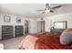 Main bedroom with king bed and dresser at 4129 W Hearn Rd, Phoenix, AZ 85053