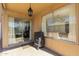 Relaxing patio with sliding glass doors and grill at 4129 W Hearn Rd, Phoenix, AZ 85053