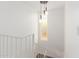 Modern white staircase with metal railing at 4129 W Hearn Rd, Phoenix, AZ 85053