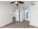 Bright bedroom with wood-look floors and ceiling fan at 4608 W Maryland Ave # 125, Glendale, AZ 85301