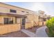 Tan stucco exterior with a landscaped walkway and entry at 4608 W Maryland Ave # 125, Glendale, AZ 85301