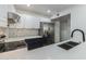 Modern kitchen with stainless steel appliances and quartz countertops at 4608 W Maryland Ave # 125, Glendale, AZ 85301