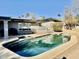 Backyard pool, a view of the home and beautiful landscaping at 511 E Port Au Prince Ln, Phoenix, AZ 85022