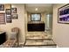 Charming hallway with a beautiful mirror and tile flooring, leading to other rooms in the home at 511 E Port Au Prince Ln, Phoenix, AZ 85022