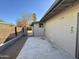 Private outdoor patio and backyard with block fencing and desert landscaping at 511 E Port Au Prince Ln, Phoenix, AZ 85022