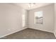 Bright bedroom featuring a window with blinds and ceiling fan at 5315 W Christy Dr, Glendale, AZ 85304