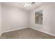 Well-lit bedroom with carpet and window blinds at 5315 W Christy Dr, Glendale, AZ 85304