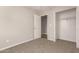 Well-lit bedroom with built-in closet and neutral walls at 5315 W Christy Dr, Glendale, AZ 85304