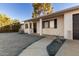 Landscaped front yard with a walkway leading to the home's entrance at 5315 W Christy Dr, Glendale, AZ 85304