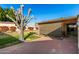 Backyard view, grassy area, patio, and covered structure at 6258 E Ivy St, Mesa, AZ 85205