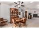 Cozy dining area with wood furniture and access to the backyard at 6258 E Ivy St, Mesa, AZ 85205