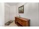 Entryway with wood console table and artwork at 6258 E Ivy St, Mesa, AZ 85205