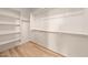 Large walk-in closet with shelves and hanging rods at 630 W Laredo St, Chandler, AZ 85225