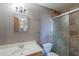 Bathroom features a shower, sink, and vanity at 6649 W Orange Dr, Glendale, AZ 85301