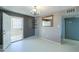 Dining room with chandelier and access to patio at 6649 W Orange Dr, Glendale, AZ 85301