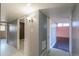 A hallway with doors leading to bedrooms and other rooms at 6649 W Orange Dr, Glendale, AZ 85301