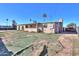 Side view of house showing backyard and landscaping at 6649 W Orange Dr, Glendale, AZ 85301