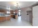 Kitchen with wood cabinets and an island counter at 6649 W Orange Dr, Glendale, AZ 85301