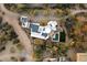 Aerial view of a unique home with solar panels and a circular design at 6708 E Calle De Las Estrellas Rd, Cave Creek, AZ 85331