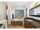 Elegant bathroom with soaking tub, double vanity, and marble finishes at 6708 E Calle De Las Estrellas Rd, Cave Creek, AZ 85331