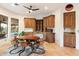 Charming dining area with custom built-ins and a view to the backyard at 6708 E Calle De Las Estrellas Rd, Cave Creek, AZ 85331